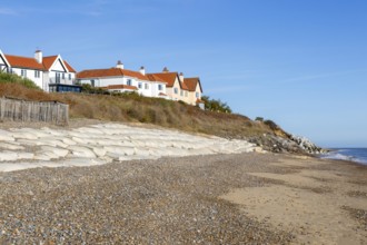 Clifftop houses at risk from coastal erosion, Thorpeness, Suffolk, North Sea coast, England, UK