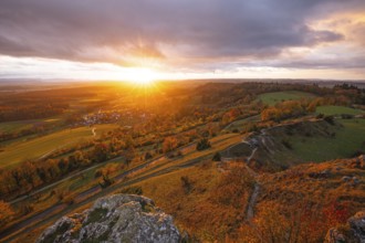 Low sun shines in the Spielburg Nature Reserve, Hohenstaufen, Göppingen, Baden-Württemberg, Germany