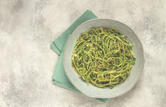 Spaghetti with pesto sauce, homemade, no people
