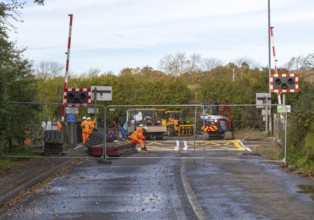 Road and rail level crossing closed, Network Rail railway line upgrade maintenance, Melton,