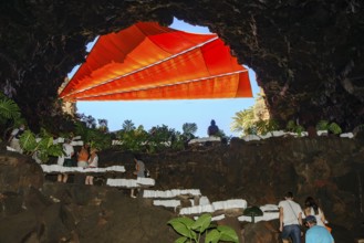 Stone staircase at the exit of lava cave system in art center cultural center tourist attraction