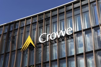 Crowe BPG, audit and consulting firm, logo on modern wooden façade with larch pilasters,
