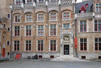 Gruuthusemuseum with equestrian statue of Lodewijk van Gruuthuse above the entrance portal in the