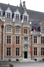 Gruuthusemuseum with equestrian statue of Lodewijk van Gruuthuse above the entrance portal in the