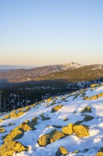 View from Mount Lusen over the hills of the bavarian forest at sunrise in winter, Bavaria, Germany