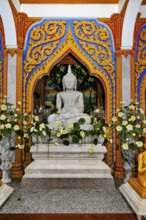 Small altar small pedestal with statue of Buddha Buddha statue in worship room room for worship in
