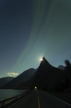 National mountain of Norway - Stetind in the Nordland under auroras and a full moon