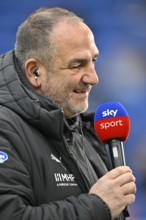 Coach coach Frank Schmidt 1. FC Heidenheim 1846 FCH portrait in interview microphone micro logo SKY
