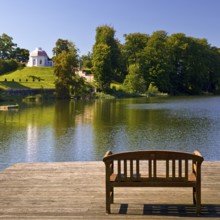 Footbridge with bench to Huwenowsee at Meseberg Castle Park, guest house and conference venue of