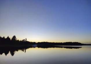 Atmospheric evening mood over Lake Grienerick, Rheinsberg, Brandenburg, Germany