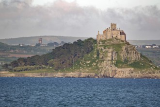 Medieval castle on a wooded seaside hill, St Michael's Mount, Cornwall, Great Britain