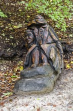 Wooden sculpture Der Haule, Pfullinger Sagenweg, stories and legends, by woodsaw artist Billy
