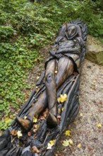 Wooden sculpture The Sleeping Count, Pfullinger Sagenweg, stories and legends, by woodsaw artist