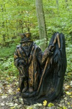 Wooden sculpture The Meerkat from Urschelberg, Pfullinger Sagenweg, stories and legends, by woodsaw