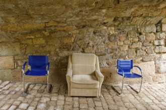 Parked furniture under a bridge arch, Rottenburg am Neckar, Baden-Württemberg, Germany