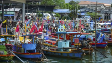 Fishing boats moored side by side in colors blue and red, Phang Nga Bay, Phang Nga Phang-nga