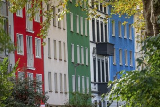 Residential buildings in Düsseldorf-Bilk, facades with different colors, rental apartments, past,