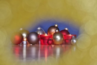 Still life with Christmas tree balls and candles, Germany