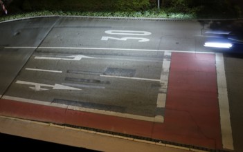 Nocturnal car traffic in a city, Germany