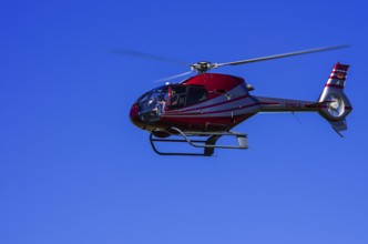 A Eurocopter EC 120B Colibri helicopter, D-HALX registration, during a flight demonstration as part