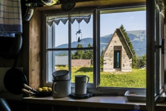 Ancient alpine hut and modern chapel, Alm Enge, Hirschau, Kanisfluh, Bregenzerwald, Vorarlberg,