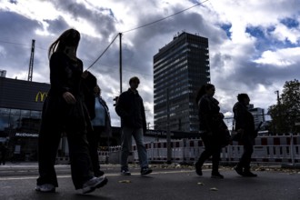 Passers-by in downtown Essen at the main train station, North Rhine-Westphalia, Germany