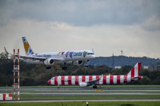 Condor aircraft landing and waiting for takeoff at Düsseldorf Airport, North Rhine-Westphalia,