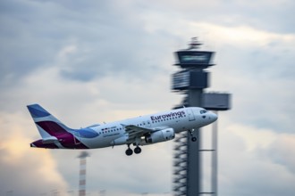 Eurowings Airbus A319 taking off from Düsseldorf Airport, Air Traffic Control Tower, North