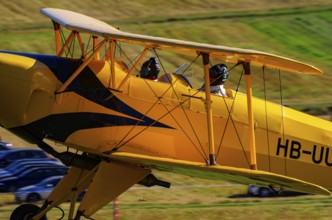 A biplane Bücker Bü 131 Jungmann with the registration HB-UUD during a flight demonstration as part