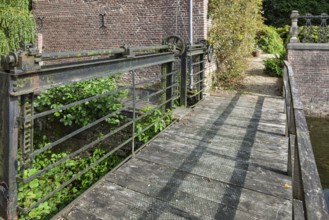 Old wooden bridge with a barrier, North Rhine-Westphalia, Germany