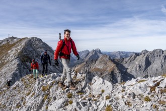 Hikers on steep Gradweg, hiking to Gamsjoch, eastern Karwendel, Tyrol, Austria