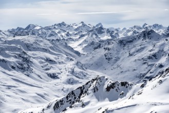 Mountain panorama with view of peaks of the Bernina Group, view from Piz Grialetsch in winter,