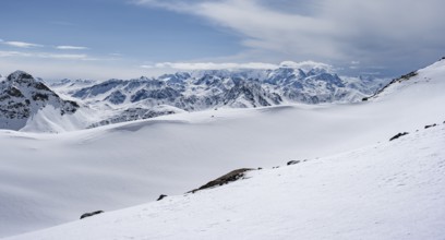 View of mountain panorama with mountain peaks of the Bernina Group, mountain scenery in winter,