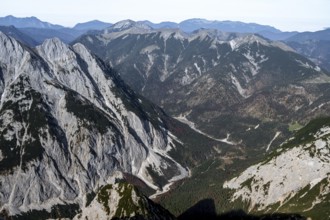 View of an extensive mountain range with forests and valleys, eastern Karwendel, Tyrol, Austria
