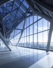 Modern architectural framework with glass and steel structure, glass facade with a greed of steel