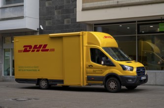 DHL delivery vehicle, e-car, electric drive, logo, delivery, parked in pedestrian zone, Stuttgart,