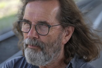 Portrait of man with beard and glasses, Franconia, Bavaria, Germany