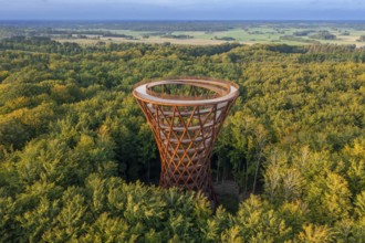 Aerial view over 45-meter-tall hyperboloid observation tower in forest near Gisselfeld monastery at