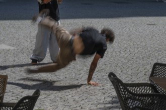 Breakdance by street artists on the market square, movement, Amberg, Upper Palatinate, Bavaria,