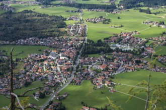 Deep view from Falkenstein of the alpine village of Inzell and the Inzeller moss, Bavaria, Germany