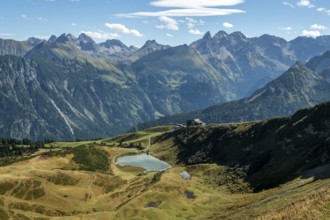 View from the Fellhorn Ridge hiking trail to Schlappoldsee and mountains of the Allgäu Alps,