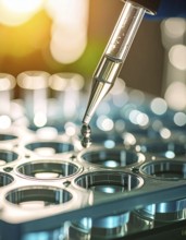 Gleaming droplet hangs from a pipette above a blue microplate in sunlit warmth, Pipette dispensing