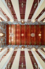 Photo from the frog persective:Ubosot (ordination hall) with columns (Sao) and richly decorated