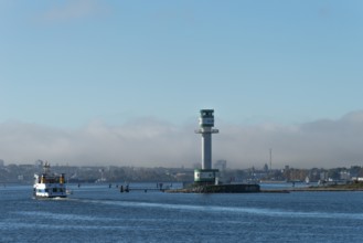 Green-white lighthouse Friedrichsort with city panorama of the state capital, Kiel Fjord, Kiel,