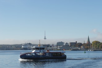 Kiel port, liner Dietrichsdorf on the fjord and Kiel-Oslo ferry on the east shore quay, ferry and