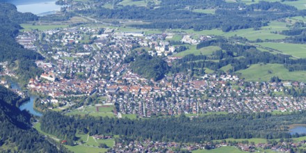 Panorama from Tegelberg, 1881m, on Füssen with historic old town, the Lech and behind it the