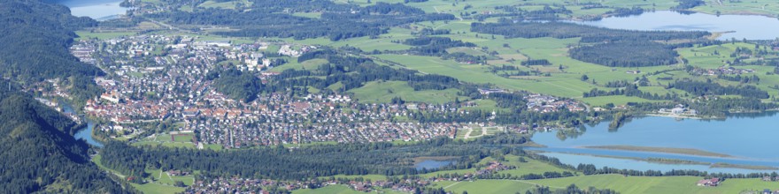 Panorama of Tegelberg, 1881m, on Füssen with historic old town, the Lech and behind it the