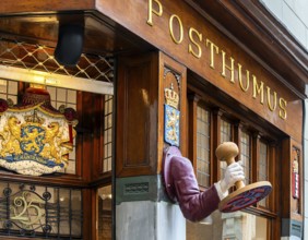 The Posthumus Shop, stationery boutique, shop façade with decorative stamp motifs, St. Luciensteeg,