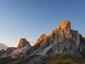 Passo di Giau at dusk, Giau Pass, in the back peaks of Ra Gusela, Nuvolau and Averau, Dolomites,