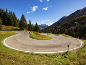 Hairpin curve on a mountain pass, Dolomite road, Passo Pordoi, Dolomites, Alps, Belluno province,